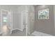 Bathroom with shower and access to other rooms at 2161 Sw 156Th Pl, Ocala, FL 34473