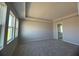 Spacious bedroom with carpet flooring and large windows at 3287 Roseville Dr, Apopka, FL 32712