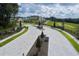 Aerial view showing community entrance with brick pavers and landscaping at 3287 Roseville Dr, Apopka, FL 32712