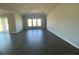 Large living area with hardwood floors and lots of natural light at 3287 Roseville Dr, Apopka, FL 32712