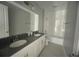 Modern bathroom with double vanity and bathtub at 3295 Roseville Dr, Apopka, FL 32712