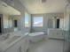 Main bath with soaking tub, double vanity, and walk-in shower at 3295 Roseville Dr, Apopka, FL 32712