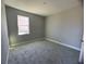 Spacious bedroom with neutral wall colors and carpet at 3295 Roseville Dr, Apopka, FL 32712