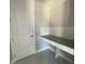 Convenient laundry room with built-in workspace at 3295 Roseville Dr, Apopka, FL 32712
