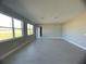 Spacious living area with tile flooring and large windows at 3295 Roseville Dr, Apopka, FL 32712
