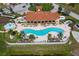 Resort-style pool with surrounding lounge chairs at 1652 Cumin Dr, Poinciana, FL 34759