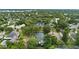 An aerial view showing a house surrounded by a green landscape at 1371 Lyndale Blvd, Winter Park, FL 32789