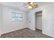 Spacious bedroom with neutral walls, carpet, and a large closet at 926 Everett St, Lake Alfred, FL 33850