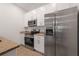 Modern kitchen with stainless steel appliances and granite countertops at 1648 Cumin Dr, Kissimmee, FL 34759