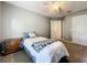 Cozy bedroom with a twin-size bed and a ceiling fan at 24341 Milford Dr, Eustis, FL 32736