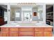 Double vanity bathroom with a large mirror and spacious countertops at 24341 Milford Dr, Eustis, FL 32736