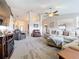 Open concept living room with sectional sofa, high ceilings and lots of natural light at 24341 Milford Dr, Eustis, FL 32736