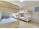Bedroom with two sets of built-in bunk beds at 5116 Killarney Way, Kissimmee, FL 34746