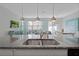 Modern kitchen with granite countertops and double sink at 5116 Killarney Way, Kissimmee, FL 34746