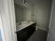 Modern bathroom with double vanity and updated fixtures at 3263 Roseville Dr, Apopka, FL 32712