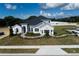 Two story home with gray siding and a gray roof at 3263 Roseville Dr, Apopka, FL 32712