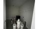 Laundry room with shelving and built-in cabinetry at 3263 Roseville Dr, Apopka, FL 32712