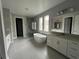Spa-like bathroom with soaking tub, walk-in shower, and double vanity at 3271 Roseville Dr, Apopka, FL 32712