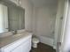 Bathroom with single vanity, tub, and tile flooring at 3279 Roseville Dr, Apopka, FL 32712