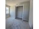 Bedroom with carpet flooring and a large closet at 3279 Roseville Dr, Apopka, FL 32712