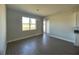 Bright dining area with hardwood floors and large windows at 3279 Roseville Dr, Apopka, FL 32712