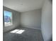 Bright bedroom with carpeted floors and large window at 3279 Roseville Dr, Apopka, FL 32712