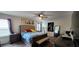 Spacious bedroom with a large bed, nightstands, and ample natural light at 196 Taft Dr, Davenport, FL 33837