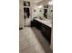 Bathroom boasts a double vanity and a separate shower at 196 Taft Dr, Davenport, FL 33837