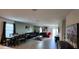 Open living space with sectional sofa, dining area, and backyard access at 196 Taft Dr, Davenport, FL 33837
