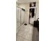 Clean bathroom with a shower, double vanity, and linen closet at 196 Taft Dr, Davenport, FL 33837