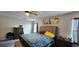 Bright bedroom featuring a king-size bed and plenty of storage at 196 Taft Dr, Davenport, FL 33837
