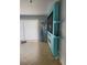 Living room with teal wall and electric fireplace at 8272 Le Mesa St, Orlando, FL 32827