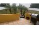 Spacious backyard with palm trees and a built-in grill at 8272 Le Mesa St, Orlando, FL 32827