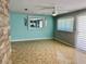 Living room with tile floors and a large mirror at 8272 Le Mesa St, Orlando, FL 32827