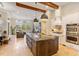 Spacious kitchen with large island, stainless steel appliances and views to Gathering room at 11227 Macaw Ct, Windermere, FL 34786