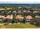 Aerial view showing the home's location in a neighborhood at 11227 Macaw Ct, Windermere, FL 34786
