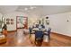 Multi-functional bonus room with a sitting area, dining table, and adjacent bedroom at 11227 Macaw Ct, Windermere, FL 34786