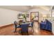 Bonus room with a sitting area, dining table, and adjacent bedroom at 11227 Macaw Ct, Windermere, FL 34786