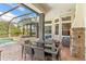 Outdoor patio with seating, dining area, and a pool at 11227 Macaw Ct, Windermere, FL 34786