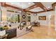 Open living space with hardwood floors, stone fireplace and high ceilings at 11227 Macaw Ct, Windermere, FL 34786