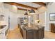Modern kitchen with large island, stainless steel appliances, and granite counters at 11227 Macaw Ct, Windermere, FL 34786