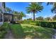 Landscaped backyard with a view of the golf course at 11227 Macaw Ct, Windermere, FL 34786