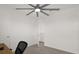 Bedroom with desk and door to closet and bathroom at 1139 August Sky Dr, Deltona, FL 32738