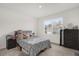 Bedroom with plush carpet and large window at 1139 August Sky Dr, Deltona, FL 32738