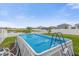 Relaxing above ground pool in a fenced backyard at 1139 August Sky Dr, Deltona, FL 32738