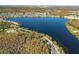 Aerial view of East Park community and lake at 10759 Gran Paradiso Dr # S, Orlando, FL 32832