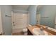 Bathroom with tub, sink, and vanity at 10759 Gran Paradiso Dr # S, Orlando, FL 32832