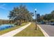 East Park community entrance with lake view at 10759 Gran Paradiso Dr # S, Orlando, FL 32832