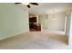 Bright and spacious living room with carpeted floors at 10759 Gran Paradiso Dr # S, Orlando, FL 32832