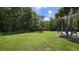 Open green space beside tennis courts at 10759 Gran Paradiso Dr # S, Orlando, FL 32832